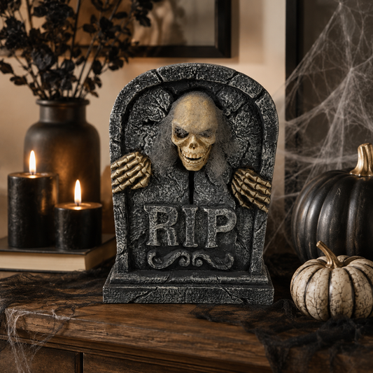 Light-up skeleton tombstone decoration with sound effects