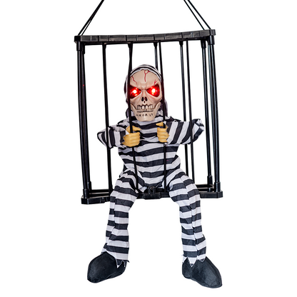 Striped Prisoner hanging caged skeleton with glowing red eyes on a white background