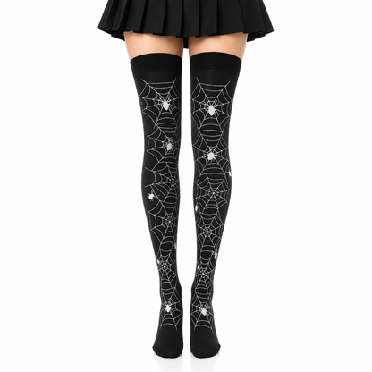Black spider web thigh-high stockings shown on a model