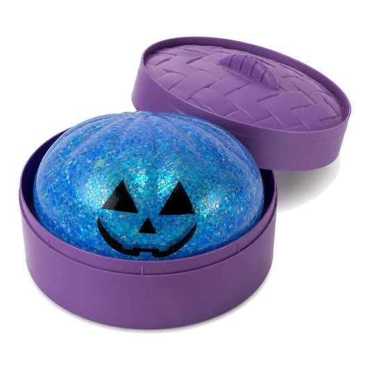 Blue glitter pumpkin squishy fidget toy in purple bun case