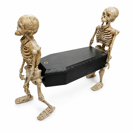 Two skeletons carrying a black coffin animated Halloween tabletop prop