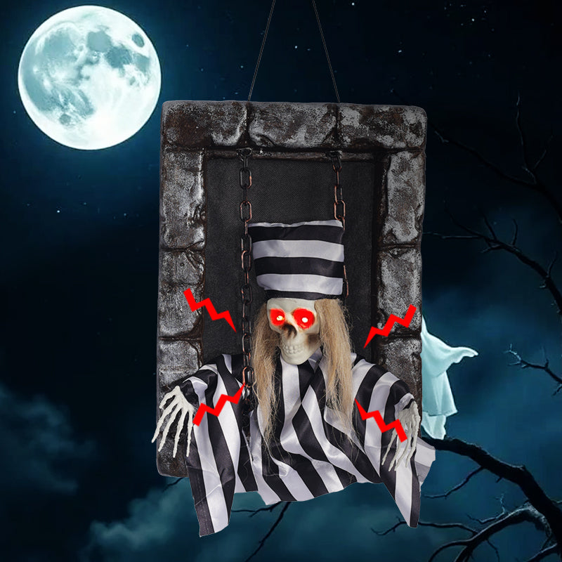 Striped prisoner tombstone figure with glowing red eyes in a moonlit Halloween scene